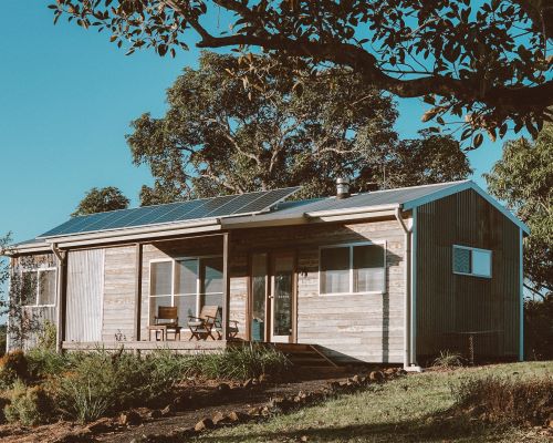 Benefits of Solar Power for SurvivalistsHome with solar panels installed on the roof.